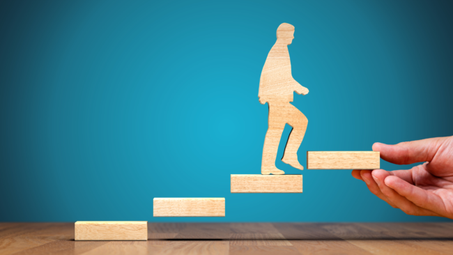 photo of man climbing steps