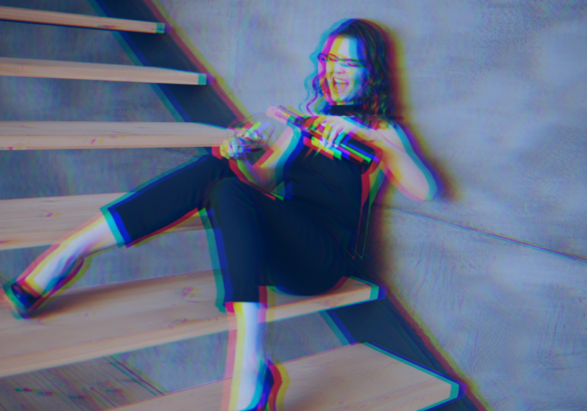Image of woman getting drunk at company's holiday party