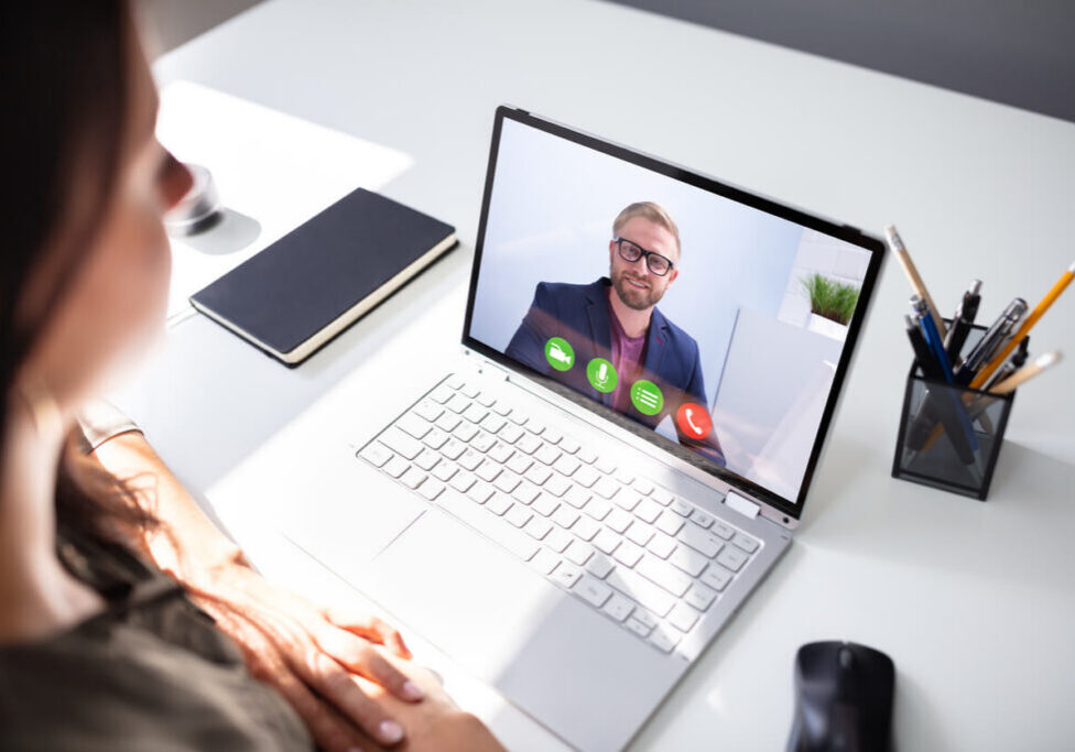 Businesswoman Video Conferencing With Coworker